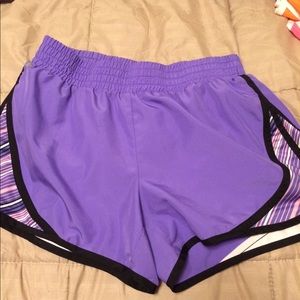 A pair of Tek running shorts